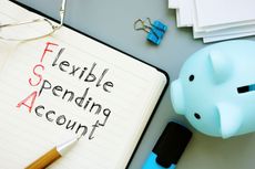 Concept art showing a notebook with "flexible spending account" written in it. 