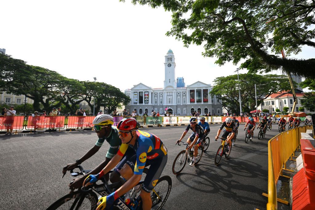 SINGAPORE SINGAPORE NOVEMBER 10 LR Biniam Girmay of Eritrea and Team IntermarcheCircusWanty Green Sprint Jersey Edward Theuns of Belgium and Team Lidl Trek and a general view of the peloton competing close to the Victoria Concert Hall during the 3rd Tour de France Prudential Singapore 2024 Criterium a 575km one day race from Singapore to Singapore on November 10 2024 in Singapore Photo by Tim de WaeleGetty Images