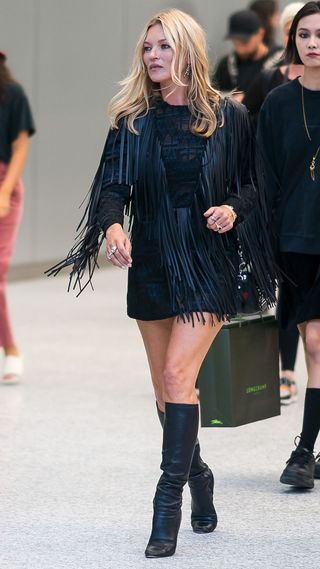 Kate Moss gave a masterclass in styling knee high boots in her fringed mini dress Woman Home