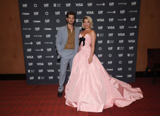 TORONTO, ONTARIO - SEPTEMBER 06: (L-R) Andrew Garfield and Florence Pugh attend the premiere of "We Live in Time" during the 2024 Toronto International Film Festival at Princess of Wales Theatre on September 06, 2024 in Toronto, Ontario.