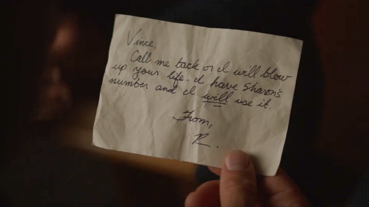 A note in Fire Country that says: "Vince, Call me back or I will blow up your life. I have Sharon's number and I will use it. From R."