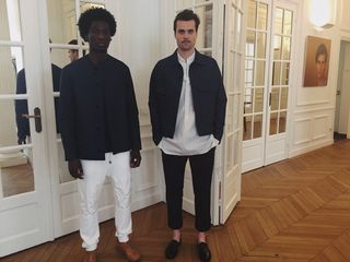 2 male models backstage in black and white collection by Paul Helbers