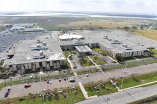 Tornado damage at NASA's Michoud Assembly Facility in New Orleans is clearly visible in this aerial view of the center. A tornado hit the NASA center on Feb. 7, 2017.
