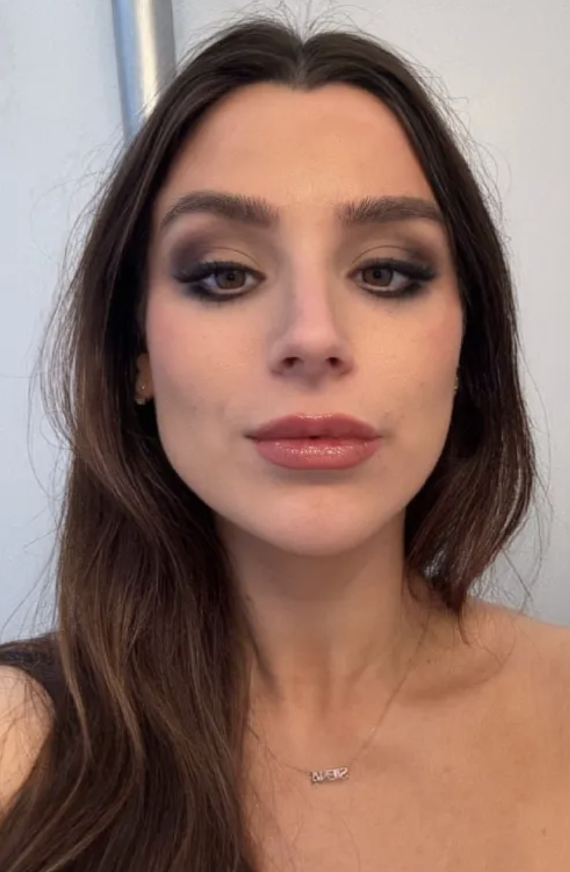 a girl with brown long hair after using Chanel Les Beiges Water-Fresh Complexion Touch.