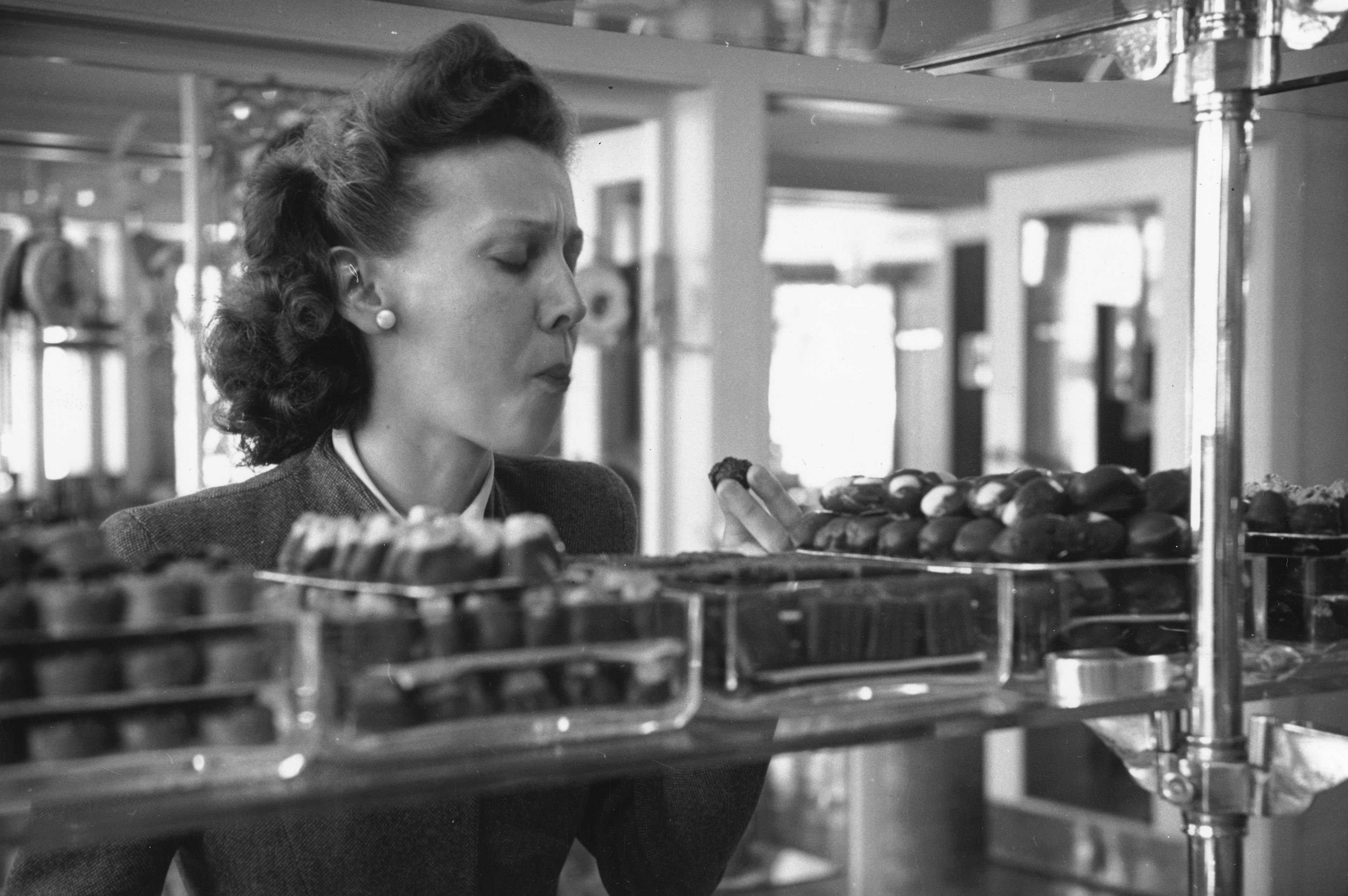 Hilda Mulholland tries some of the umpteen varieties of chocolate at a cake shop in Switzerland, where she is on her honeymoon