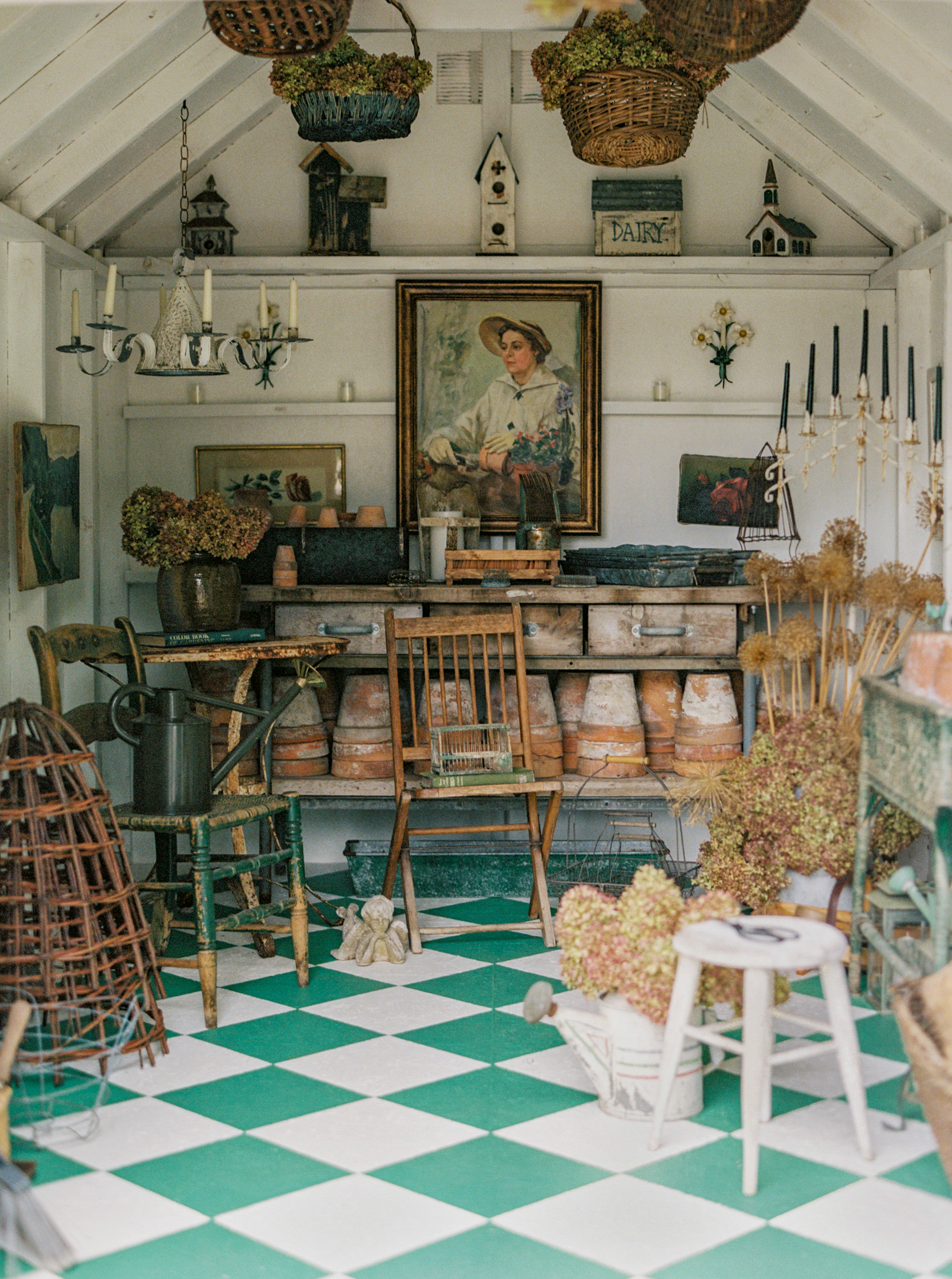 Image of a potting shed filled with vintage decor and pots