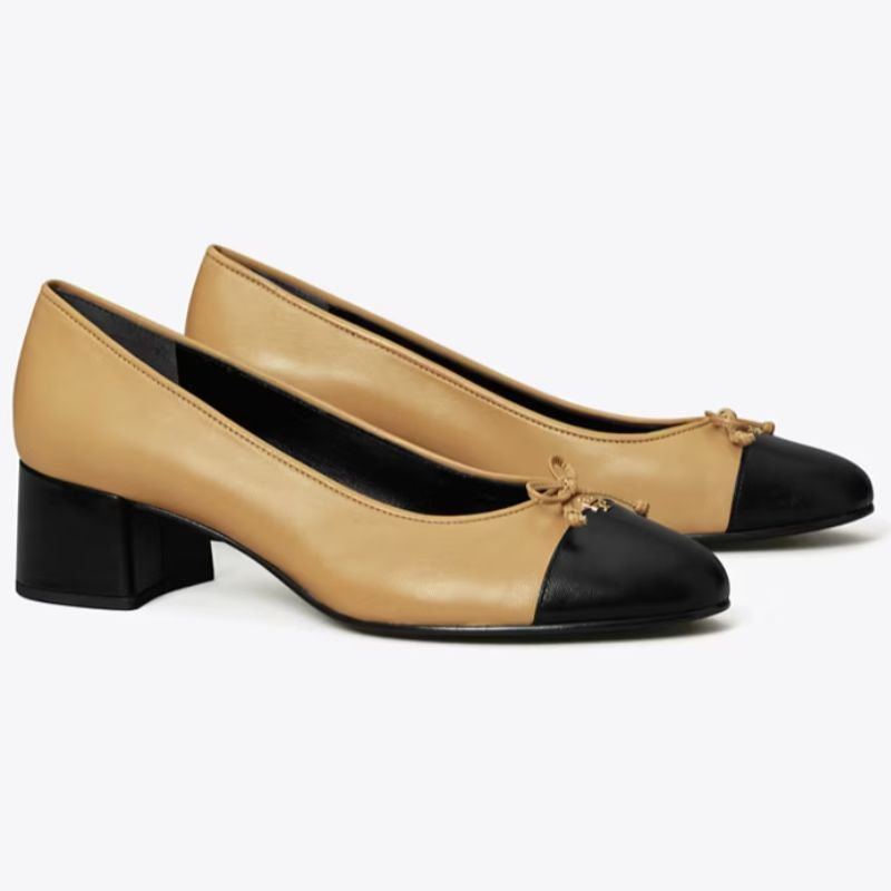 two tone shoes, beige body and black toe cap with a small block heel