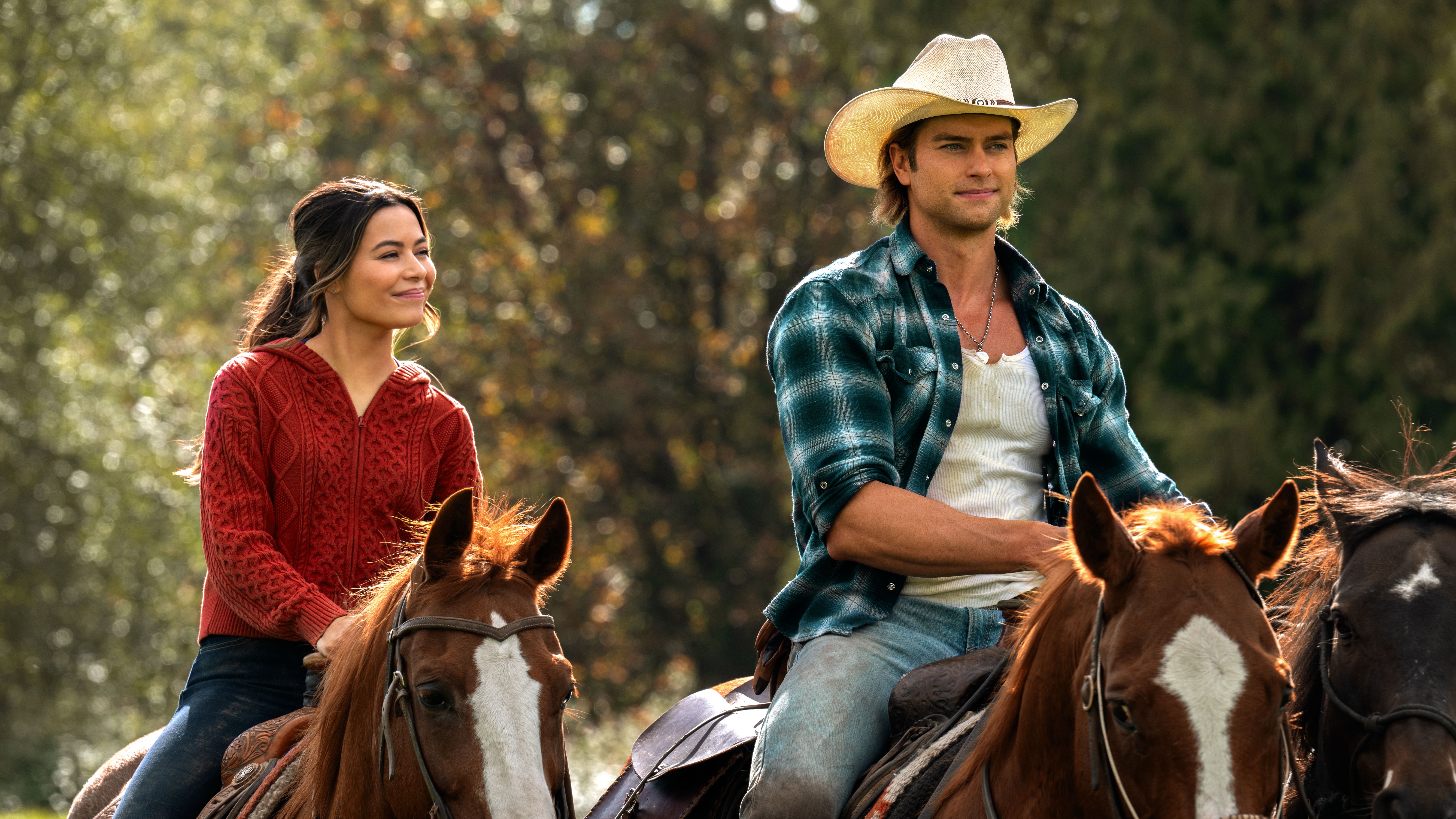 L-R: Dawn (Miranda Cosgrove) and Trey (Pierson Fodé) on horseback in a scene from Netflix&#039;s &quot;The Wrong Paris&quot;