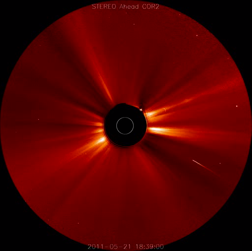 Soon after a huge solar storm erupted on May 20-21, 2011, a comet (bright streak at lower right) plunged into the sun. This shot is a still from a video taken by one of NASA&#039;s twin STEREO spacecraft. 