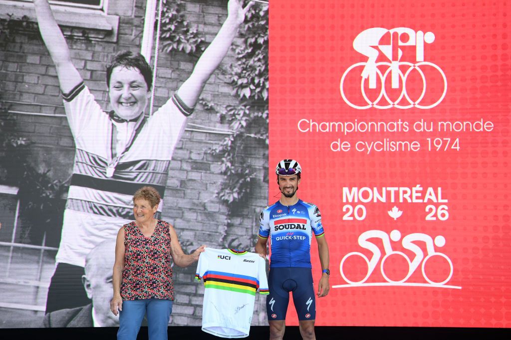 MONTREAL QUEBEC SEPTEMBER 15 LR Genevieve Gambillon of France former French road bicycle racer 1972 and 1974 Road World Champion and Julian Alaphilippe of France and Team Soudal QuickStep prior to the 13th Grand Prix Cycliste de Montreal 2024 a 2091km one day race from Montreal to Montreal UCIWT on September 15 2024 in Montreal Quebec Photo by Alex BroadwayGetty Images