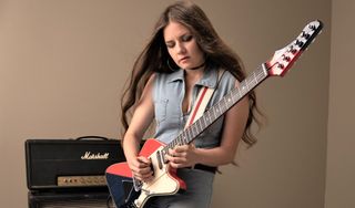 Arielle, pictured playing her signature Brian May Guitars model