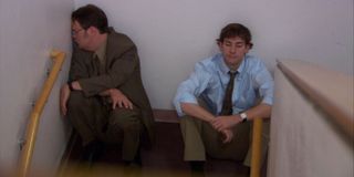 Jim and Dwight in the hallway in The Office.