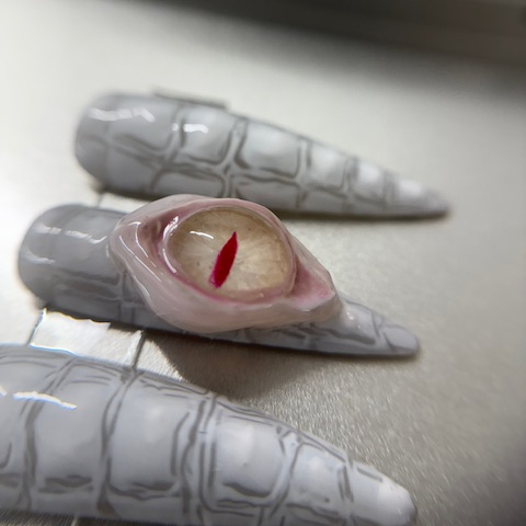 Doechii's alligator claws