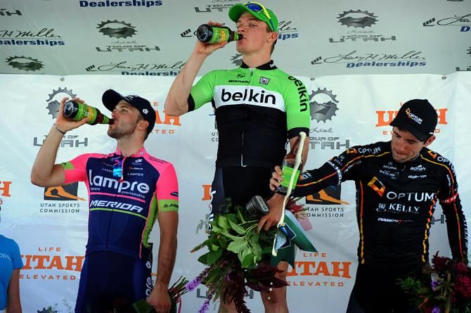 Moreno Hofland (Belkin) takes a well-deserved sip of beer on the podium