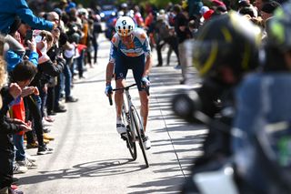 LIEGE BELGIUM APRIL 24 Romain Bardet of France and Team dsmfirmenich PostNL competes in the chase group while fans cheer during the 110th Liege Bastogne Liege 2024 Mens Elite a 2545km one day race from Liege to UCIWT on April 24 2024 in Liege Belgium Photo by Dario BelingheriGetty Images