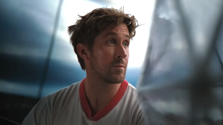 Ryan Gosling looking to his left at Rocky (off screen) in Project Hail Mary 