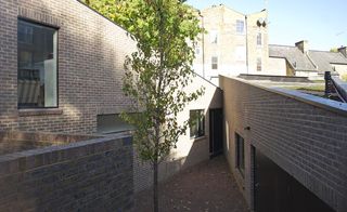 Between the two houses is a triangular courtyard. 'This communal, shared area is at the heart of the site and makes an excellent party space,' says Reynolds