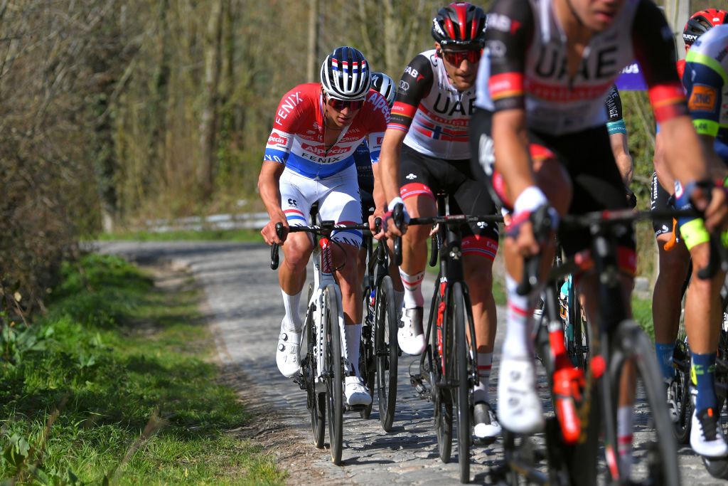 WAREGEM BELGIUM MARCH 31 Mathieu Van Der Poel of Netherlands and Team AlpecinFenix during the 75th Dwars Door Vlaanderen 2021 Mens Elite a 1841km race from Roeselare to Waregem Cobblestones DDV DDV21 FlandersClassic A travers la Flandre on March 31 2021 in Waregem Belgium Photo by Luc ClaessenGetty Images