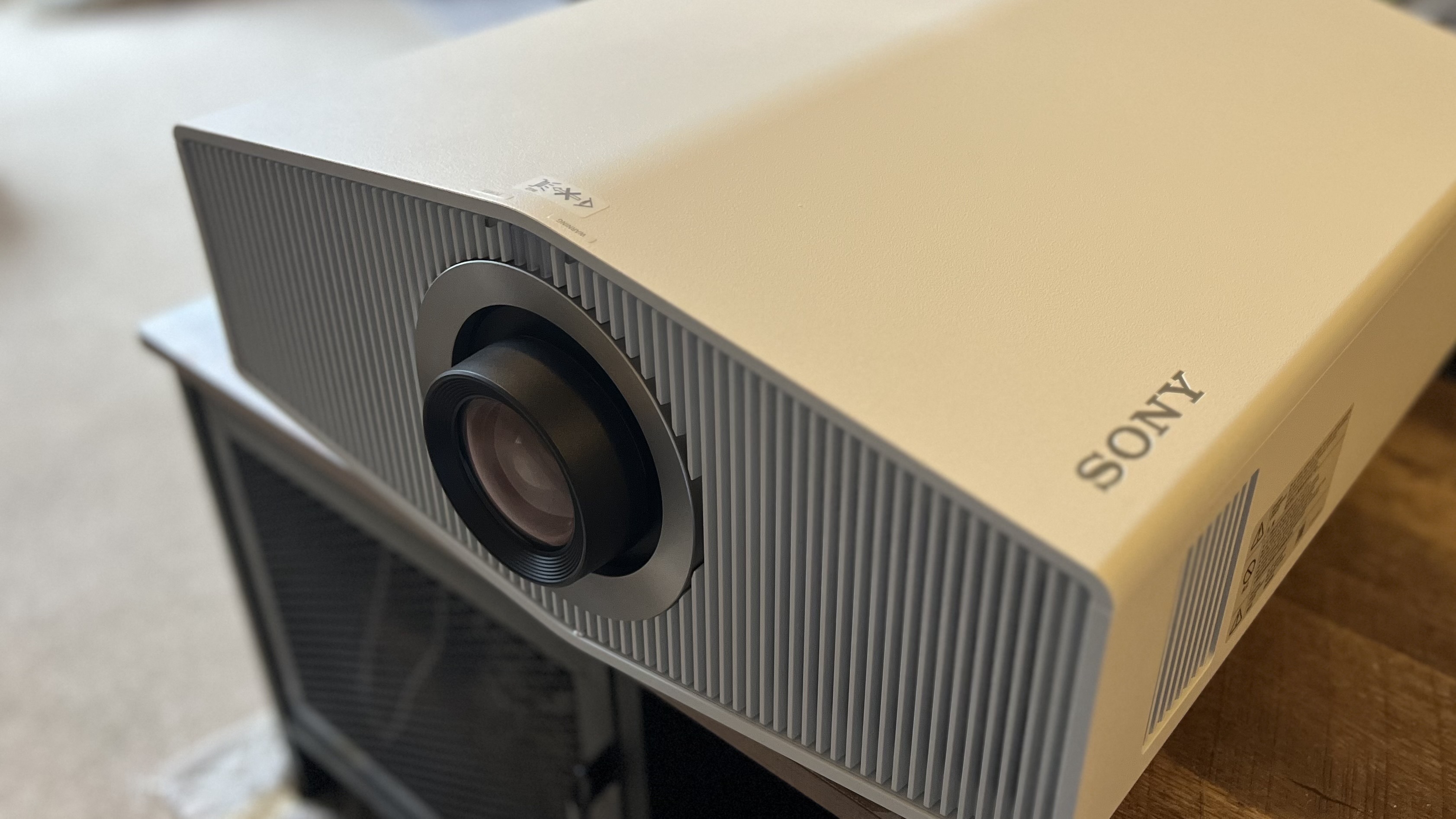 Sony BRAVIA Projector 8 (VPL-XW6100ES) front and main chassis on a wooden coffee table