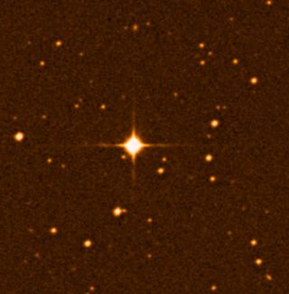 multiple orange stars with a particularly large and bright one in the center of the image.