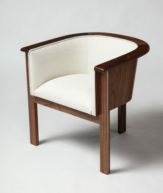 Wooden semi circular chair with white seat and back padding