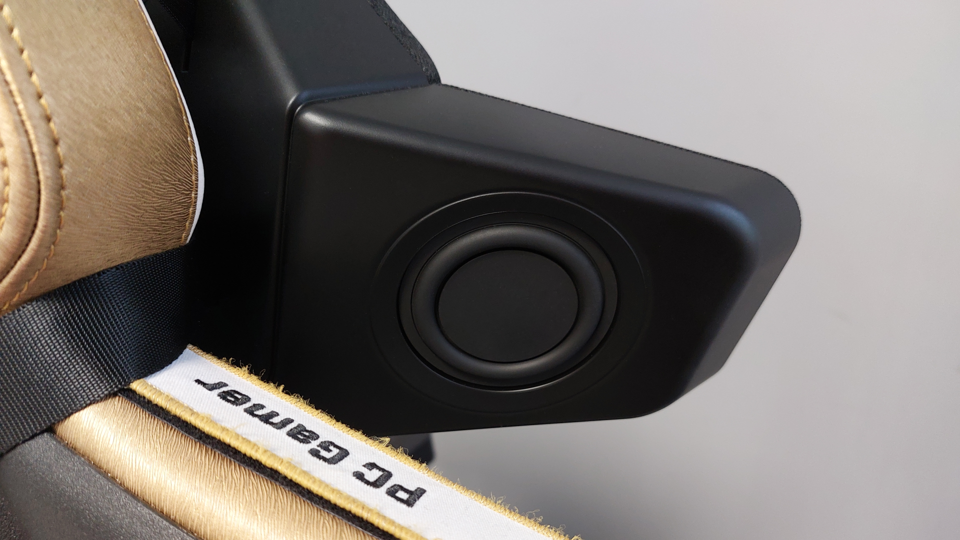 The Razer Clio headrest speaker mounted to a Backforce chair.