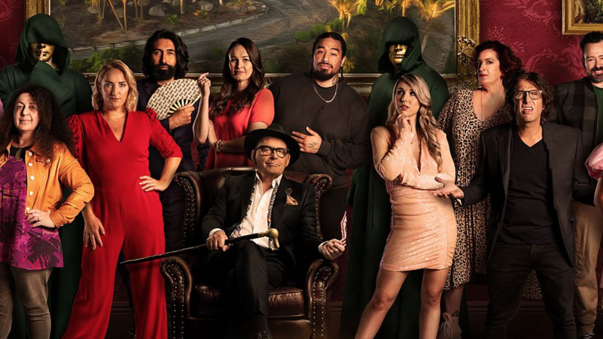 Traitors New Zealand - Some of the season one contestants line-up alongside host Paul Henry (seated)