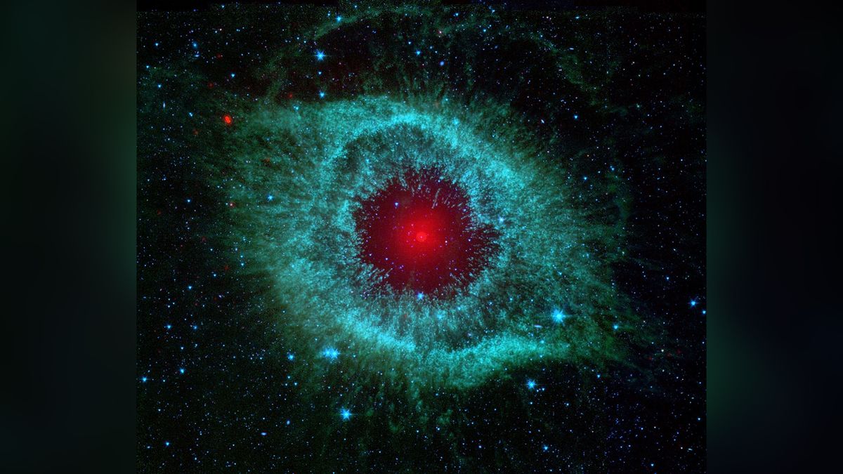 This infrared image from NASA&#039;s Spitzer Space Telescope shows the Helix nebula, a cosmic starlet often photographed by amateur astronomers for its vivid colours and resemblance to a giant eye. An optimised and digitally enhanced version of a NASA/ ESA image.