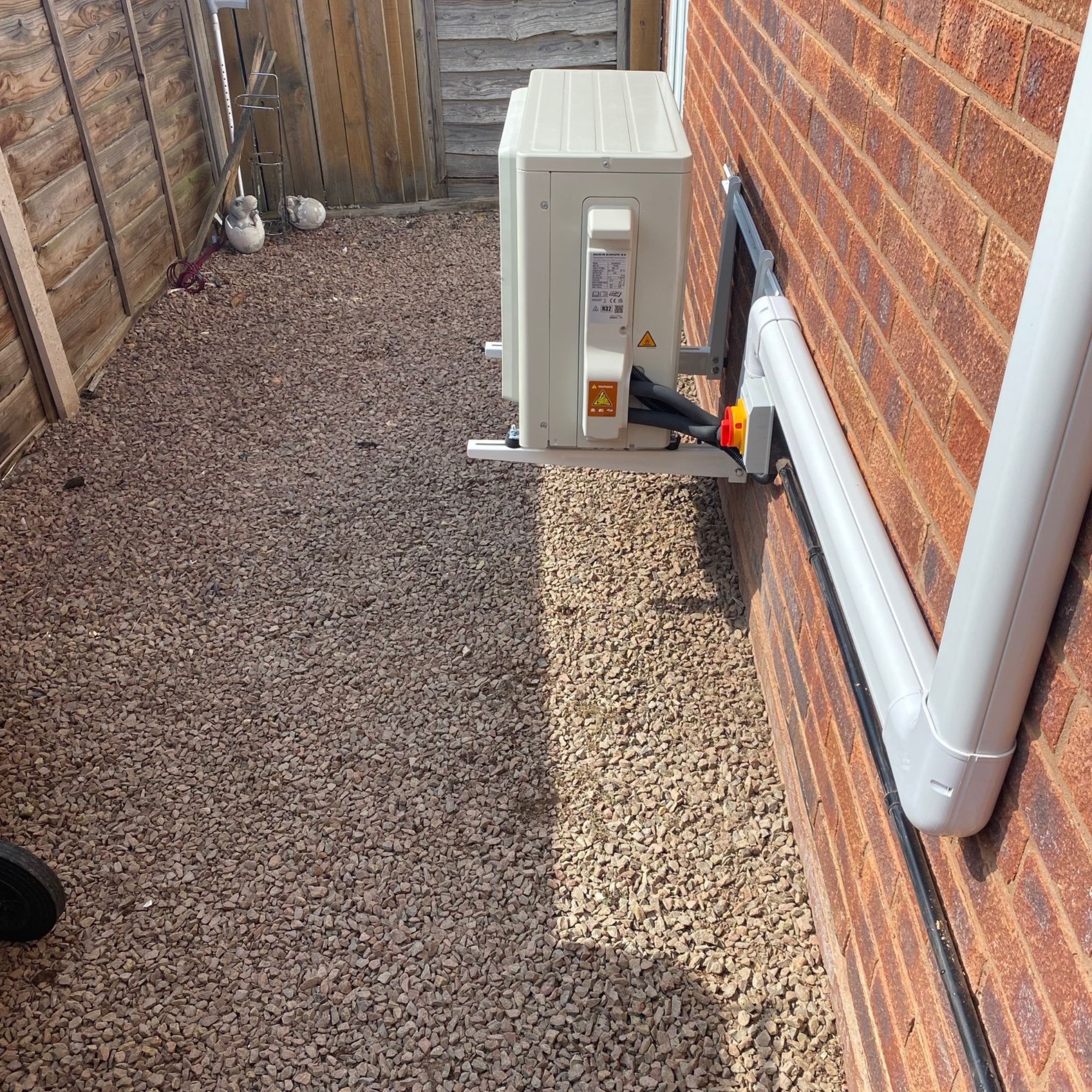 Outdoor air con unit and trunking installed on the exterior wall