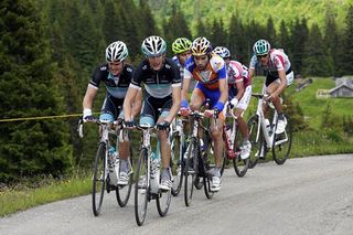 Andy Schleck sets tempo for Leopard Trek teammate Jakob Fuglsang in the lead break on the climb of the Grosse Scheidegg.