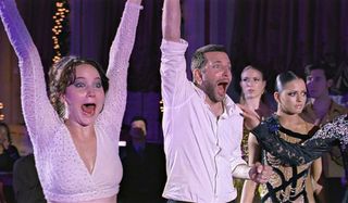 Jennifer Lawrence and Bradley Cooper celebrate good news in Silver Linings Playbook.