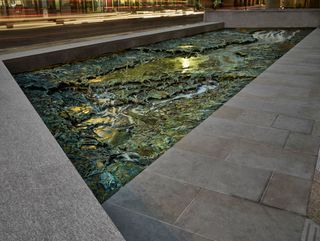 orgotten Streams, (South-West Side), 2017 Bronze, stone, hydraulic mechanism and water 10,1 x 25,6 x 10 x 15,75 m Photo: Jose Luis López de Zubiria