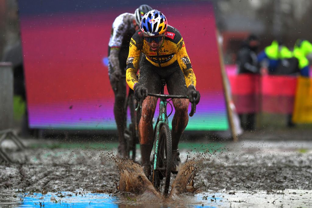 DENDERMONDE BELGIUM DECEMBER 27 Wout Van Aert of Belgium and Team Jumbo Visma Mathieu Van Der Poel of The Netherlands and Team Alpecin Fenix Mud during the 1st Dendermonde World Cup 2020 Men Elite dendermonde CXWorldCup UCICyclocrossWC Cyclocross on December 27 2020 in Dendermonde Belgium Photo by Luc ClaessenGetty Images