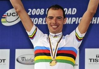 Ballan solos to cycling's famed rainbow jersey