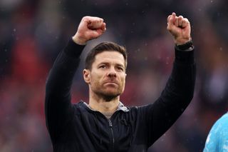 Liverpool target Xabi Alonso, Head Coach of Bayer Leverkusen, celebrates following the team's victory in the Bundesliga match between Sport-Club Freiburg and Bayer 04 Leverkusen at Europa-Park Stadion on March 17, 2024 in Freiburg im Breisgau, Germany.