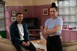 Cleo McQueen looking worried with Abe Fielding.