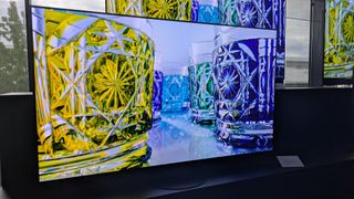 Panasonic Z95B OLED TV displaying yellow and blue glass on screen