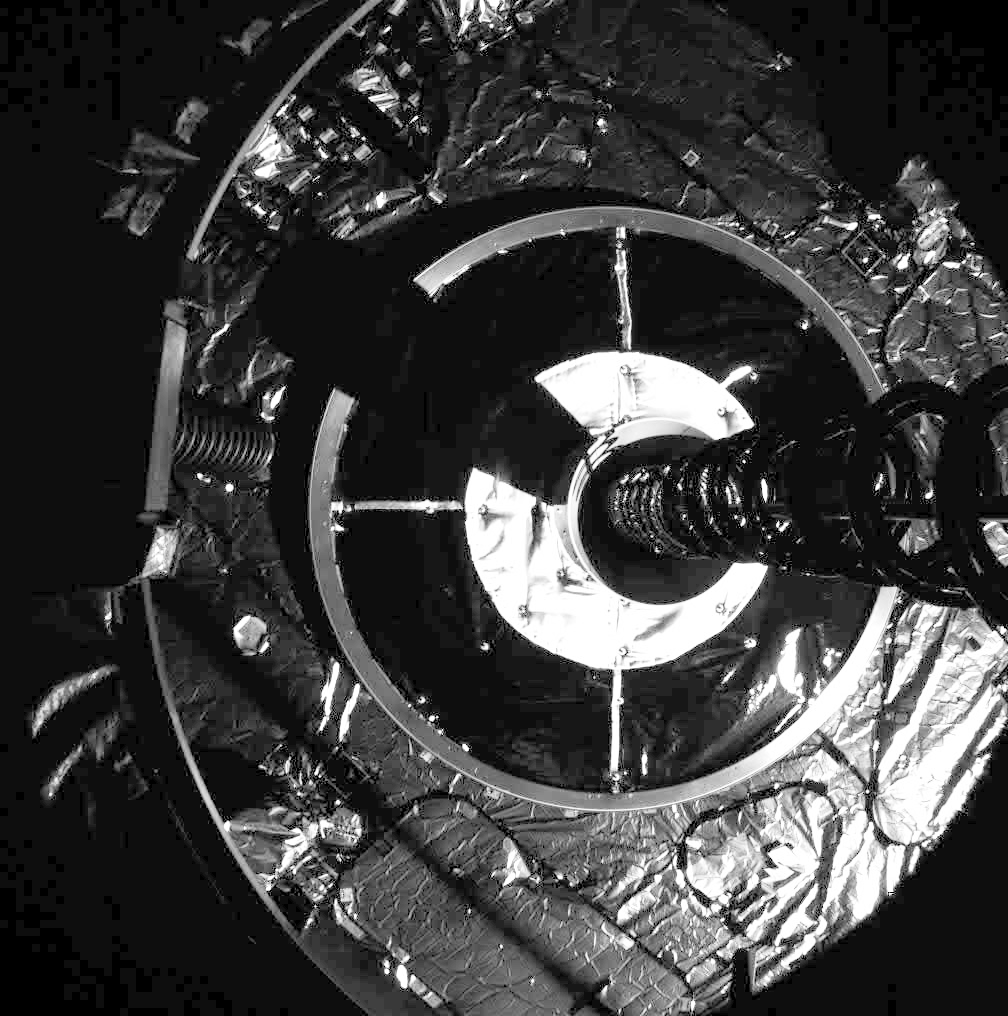 In a historic first, Northrop Grumman's privately built MEV-1 satellite servicing spacecraft captures the Intelsat 901 communications satellite on Feb. 25, 2020. MEV-1's grappler (right) latched on to Intelsat's engine nozzle at center.