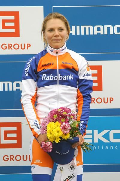 Sanne van Paassen (Rabobank Women Cycling) on the podium after winning the first World Cup of the season.
