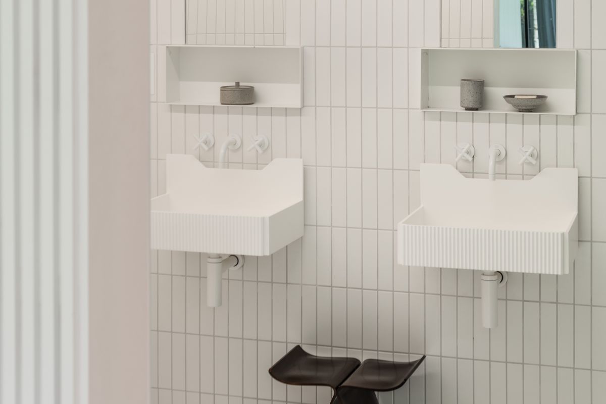 His and her sinks in the en suite bathroom