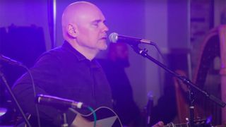 Billy Corgan performing live at the Together And Together Again benefit on July 27