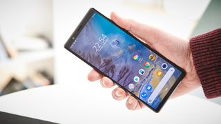 A Sony Xperia 5 in someone's hand