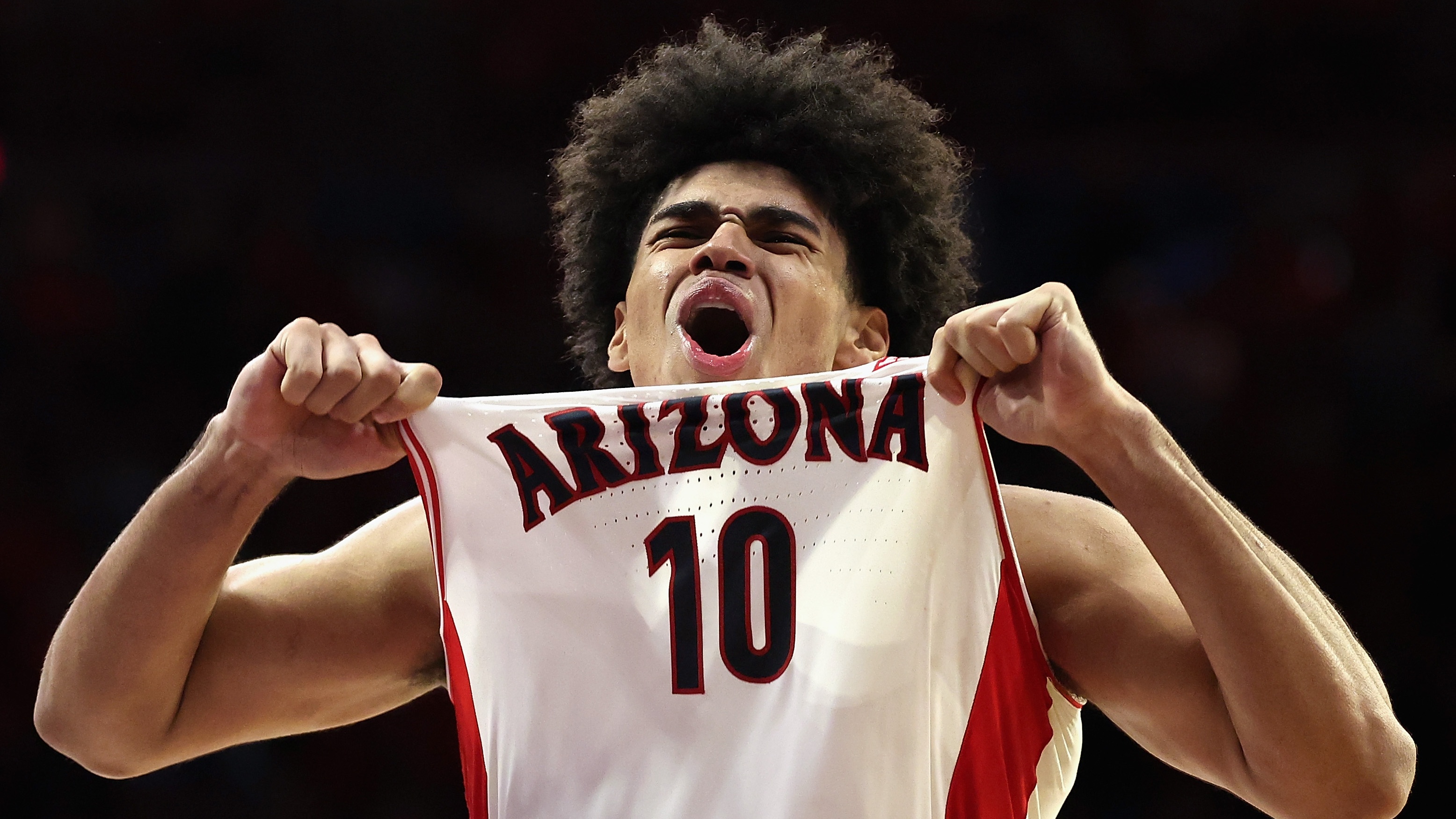 Koa Peat #10 of the Arizona Wildcats celebrates after scoring against the Arizona State Sun Devils during the second half of the NCAAB game at McKale Center on January 14, 2026 in Tucson, Arizona. The Wildcats defeated the Sun Devils 89-82. 