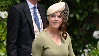 Princess Eugenie wears a green Joseph dress and a fascinator while attending the wedding of Olivia Henson and the Duke of Westminster