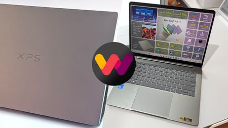 A Dell XPS laptop with a gray lid and an open Swift Air 14 display showcasing specifications. An abstract logo in pink, purple, and yellow overlaps the images.