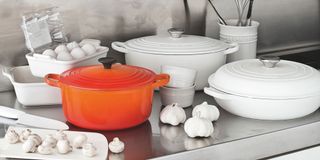 Le creuset cookware in white and orange