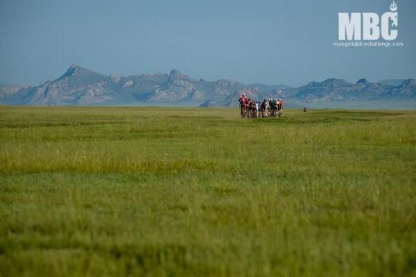 Racing through grassland