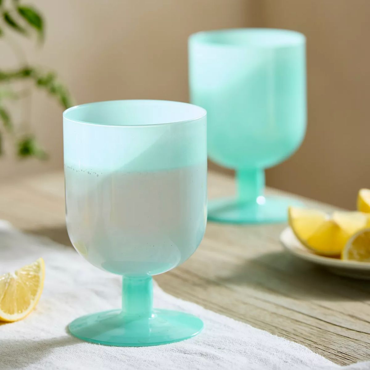 Two bright olo blue drinking glasses