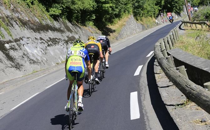 Vincenzo Nibali (Liquigas - Cannondale) follows the Sky duo of Bradley Wiggins and Chris Froome on the descent
