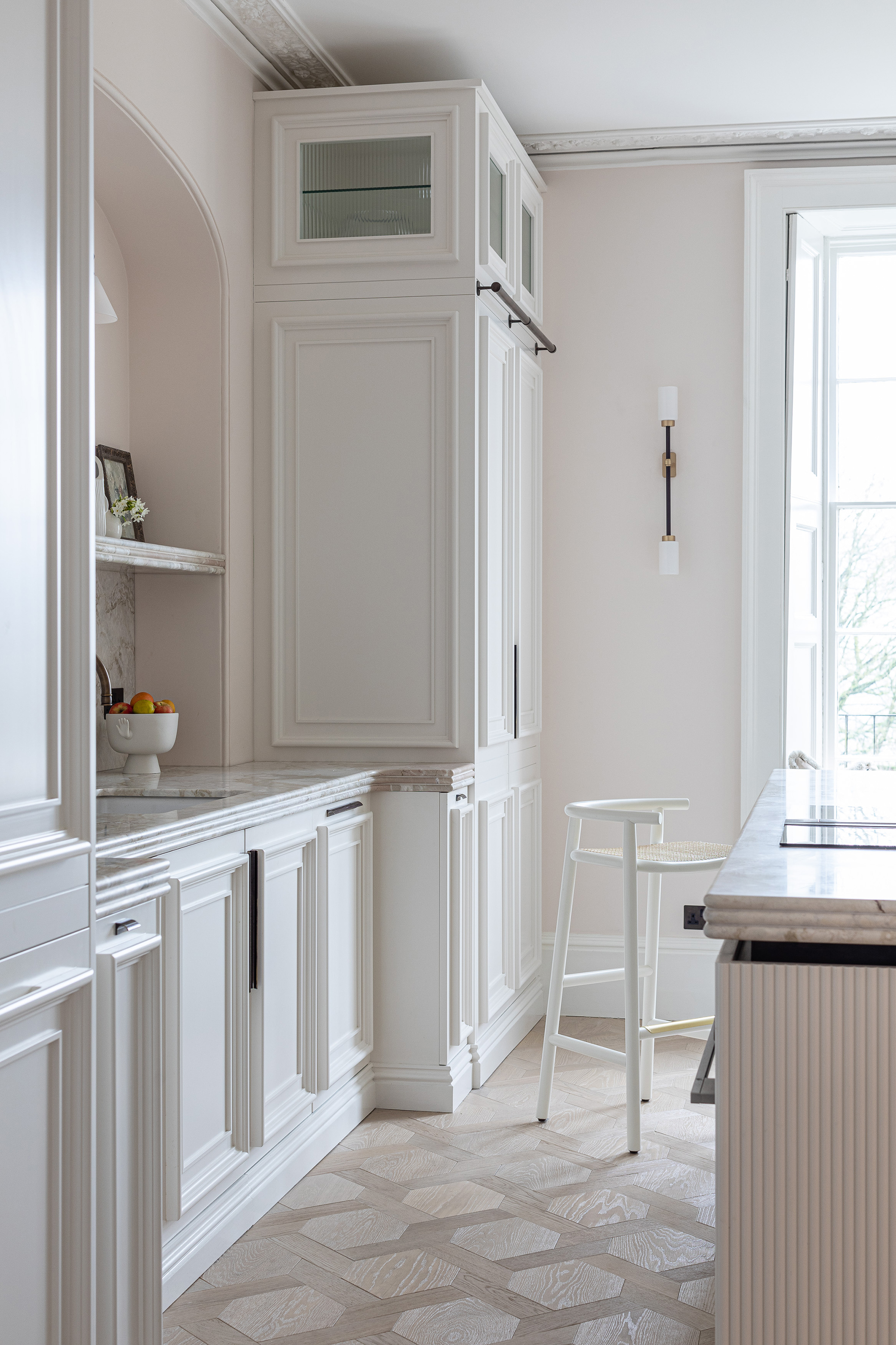 White kitchen with walls in Holland Park by Mylands